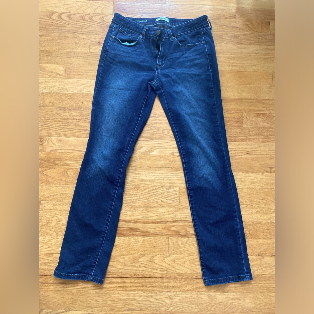A pair of stylish and very blue jeans.